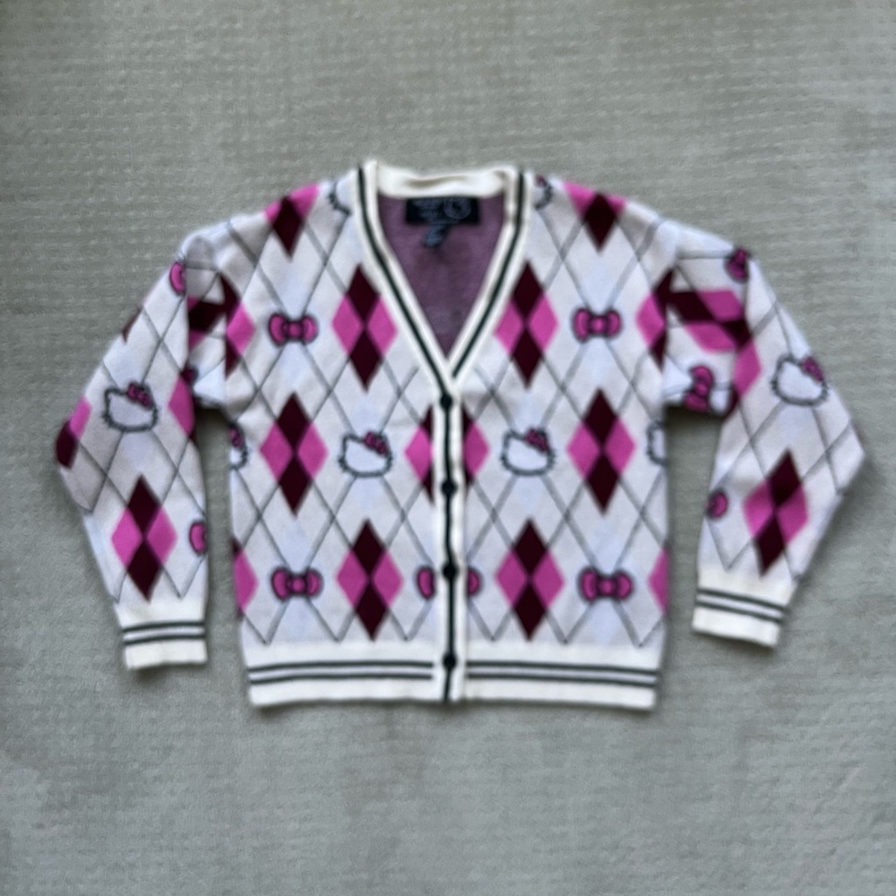 Gently used girl’s Hello Kitty Cardigan size 9/10